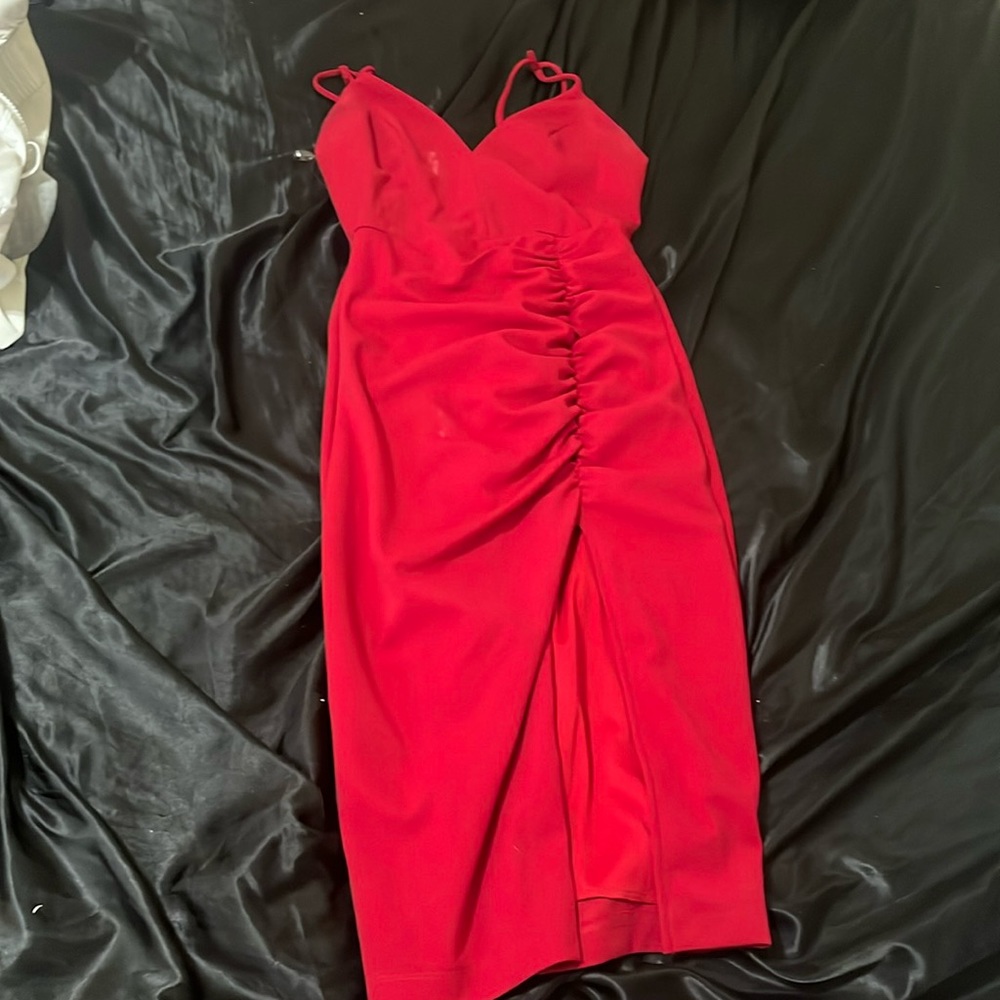 Slit in the front of the dress long and bodyconned.